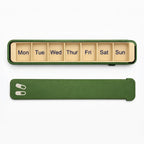 Olive green Glidra 7-day pill organizer by InnoLab Design, compact and travel-safe with plant-based materials.