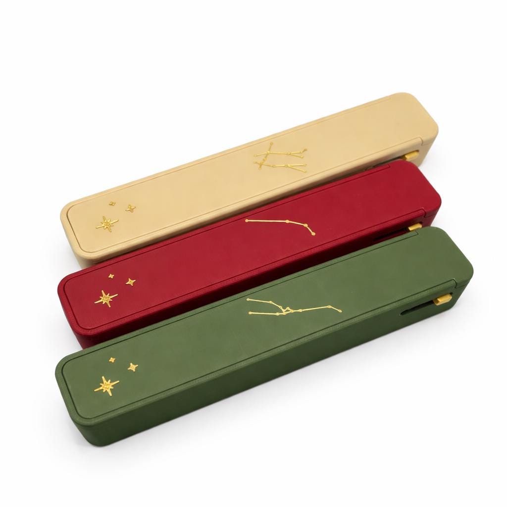 Premium Zodiac Weekly Pill Box constellation product photo — slide-lock 7-day medication organizer