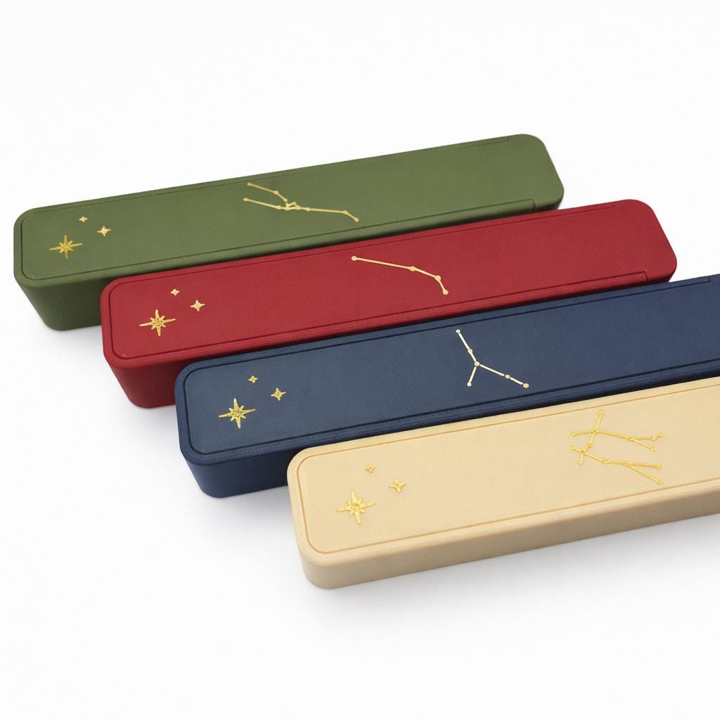 Premium Zodiac Weekly Pill Box — constellation slide-lock medication organizer product photo
